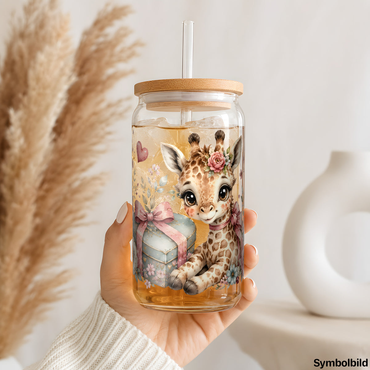 Becher-Aufkleber „Giraffenbaby mit Geschenk“ auf einem 16oz Glasbecher