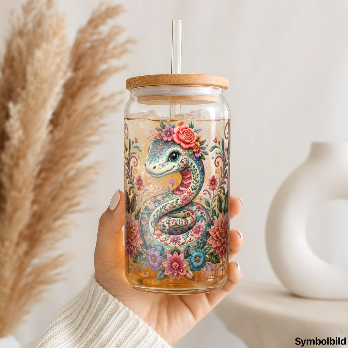 Folklore-Schlange-Aufkleber auf einem 16oz Glasbecher