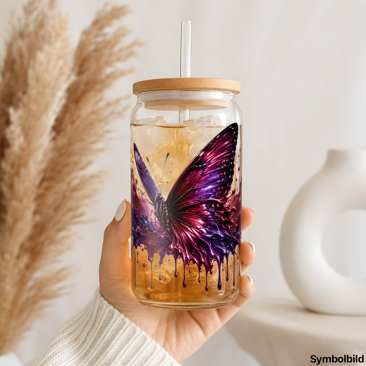 Becher-Aufkleber „Schmetterling im Farbrausch“ auf einem 16oz Glasbecher