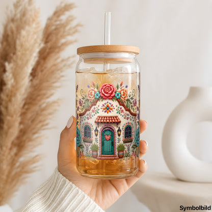 Folklore-Häuschen-Aufkleber auf einem 16oz Glasbecher
