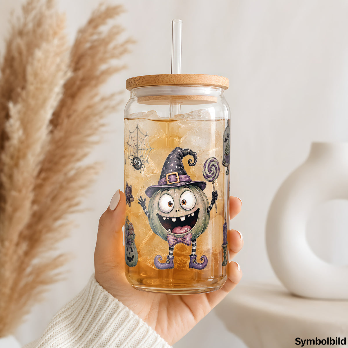 Becher-Aufkleber „Monsterchen und Naschkram“ auf einem 16oz Glasbecher